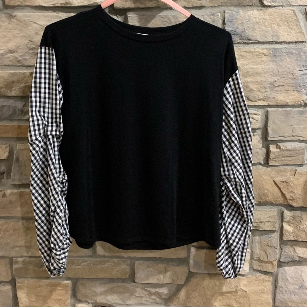 Black sweater with  B & W, puffy gingham sleeves